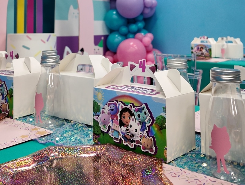 Dollhouse-themed party table setup at Kidz Kastle children’s party venue RI.